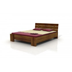 Vyššia posteľ z borovice do spálne s úložným priestorom