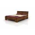 Vyššia posteľ z borovice do spálne s úložným priestorom